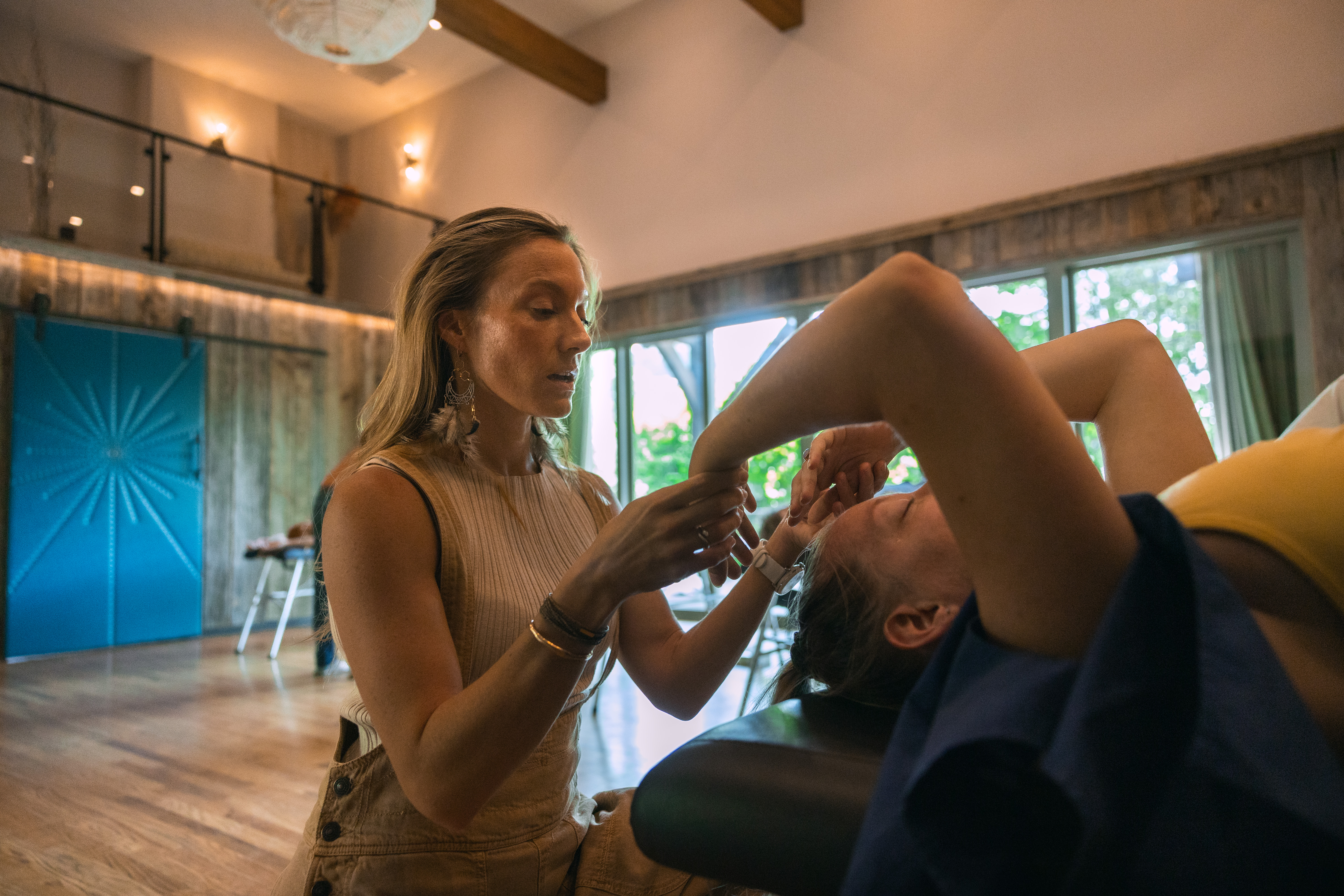 Chelsea Rae working with a client at The Sanctuary